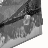 Close-up of a modern wall art collection featuring vibrant landscapes and serene lakes, printed on acrylic glass, showcasing intricate details and vivid colors. Perfect for enhancing home decor with a touch of nature-inspired elegance.