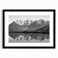 Framed wall art collection showcasing serene landscapes of lakes, presented in a sleek black frame with a white mat, ideal for modern home decor.