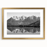 Framed wall art collection showcasing serene lake landscapes in soft pastel colors, featuring a gold mat and elegant frame, perfect for home decor enhancement.
