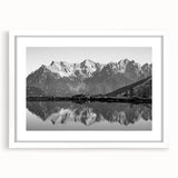 Framed landscape wall art featuring serene lake and mountain scenery, with a white mat, perfect for home décor or office ambiance. Ideal for nature lovers.