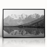 Framed acrylic wall art featuring a serene lake landscape design, showcasing vibrant colors and intricate details, presented in a sleek black frame for modern decor.