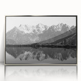 Framed wall art collection showcasing serene lake landscapes with silver accents, designed to enhance home decor and create a tranquil atmosphere.