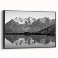 Framed canvas wall art collection showcasing serene lake landscapes with vibrant colors, displayed from a side view to highlight its black frame and artistic depth.