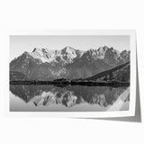 Vibrant rolled print of a serene lakeside landscape featuring lush greenery and a calm blue lake, ideal for home decor and art enthusiasts.