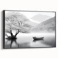 Framed canvas wall art showcasing a serene landscape with a tranquil lake and mountains in the background, featuring a sleek black frame and side view for depth. Perfect for enhancing home decor with nature-inspired aesthetics.