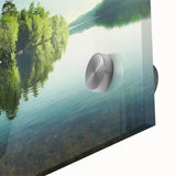 Vibrant close-up of a stunning acrylic glass wall art piece showcasing a serene lake landscape, featuring rich blues and greens, ideal for modern decor.