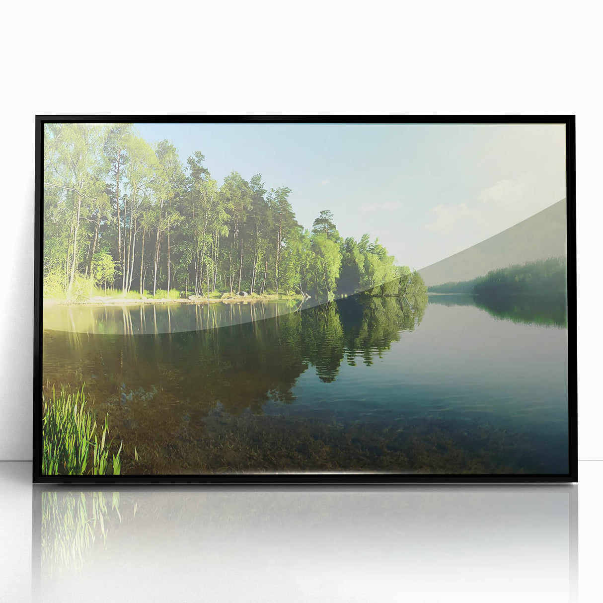 Framed wall art featuring a serene lake landscape design in rich blues and greens, set against a sleek black frame, perfect for enhancing modern home decor.
