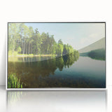 Framed acrylic wall art featuring a serene landscape with a tranquil lake scene, white frame accentuating the artwork, perfect for home decor.