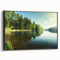 Framed canvas wall art showcasing a serene lakeside landscape with vibrant colors and intricate details, featuring a sleek black frame, ideal for home decor.
