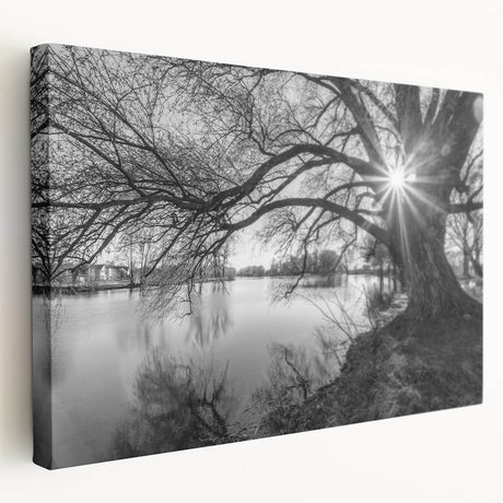 Stretched canvas wall art showcasing a serene landscape with a tranquil lake surrounded by lush greenery, perfect for enhancing home decor. Ideal for nature enthusiasts.