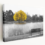 Stretched canvas wall art showcasing a serene lake landscape, featuring vibrant blues and greens. Ideal for home decor, adding a calming touch to any space.