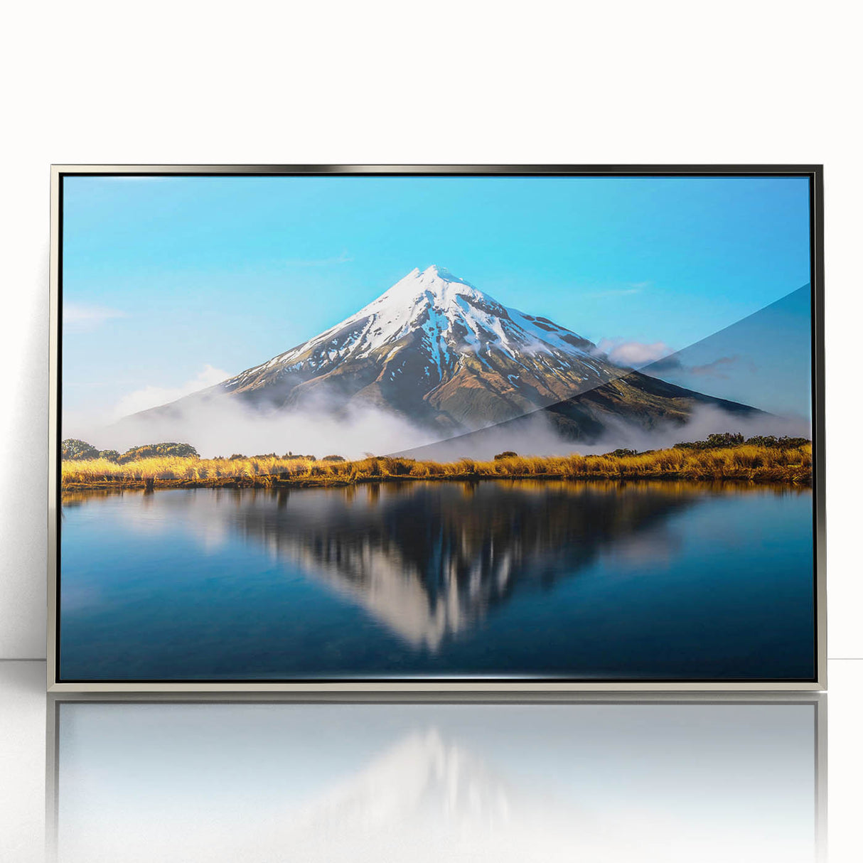 Framed acrylic wall art showcasing a serene lake landscape with vibrant colors and silver accents, designed to enhance modern home décor.