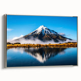 Framed canvas wall art showcasing a serene lake landscape with vibrant colors and silver accents, designed to enhance modern home decor. Ideal for nature enthusiasts and interior design lovers.