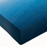 Close-up of a stretched canvas wall art piece showcasing a serene landscape with a tranquil lake, vibrant colors, and intricate details, ideal for home decor.