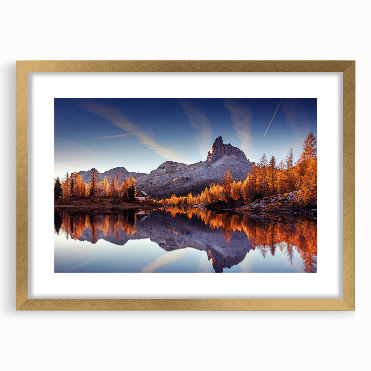 Elegant framed wall art featuring a serene lakeside landscape design, accented with a gold mat and frame, ideal for enhancing home decor and bringing a touch of nature indoors.