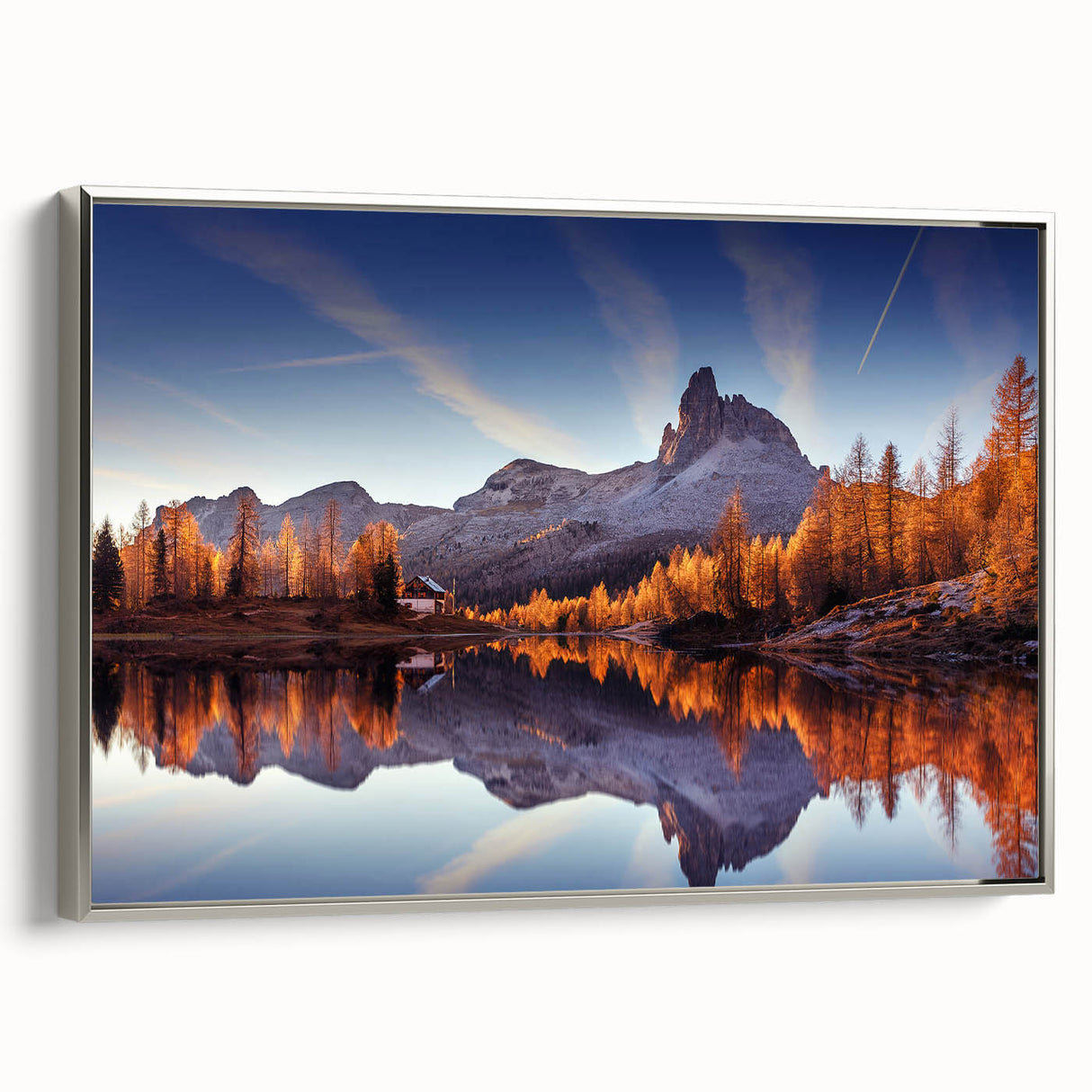 Framed canvas wall art showcasing a serene lake landscape with vivid colors, silver frame accentuating the design, ideal for modern home decor.