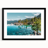 Framed landscape wall art featuring a serene lake scene with vibrant colors, a black mat, and a sleek black frame, ideal for home decor enhancement.
