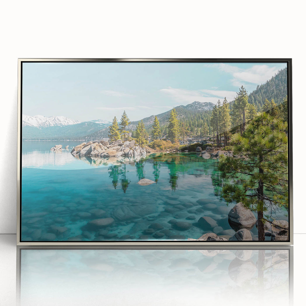 Framed acrylic wall art showcasing a serene lake landscape design with vibrant colors, set in a sleek silver frame, perfect for modern home decor.