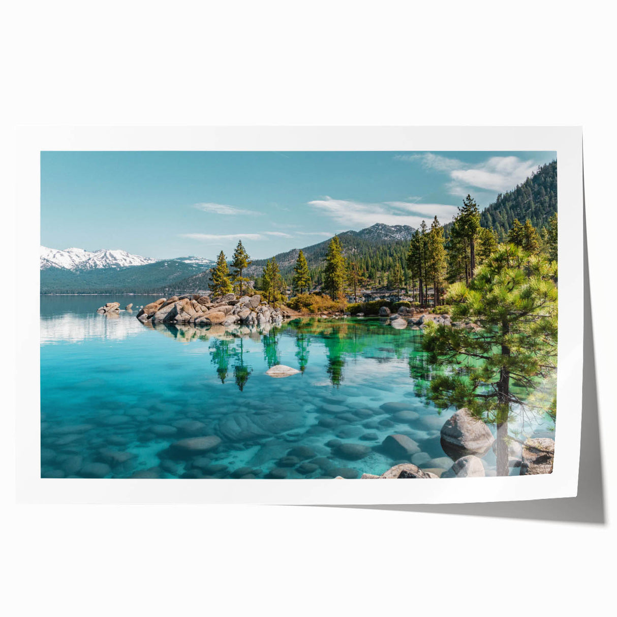 Rolled print of a serene lakeside landscape featuring vibrant blues and greens, showcasing detailed reflections of trees on water, perfect for home decor.