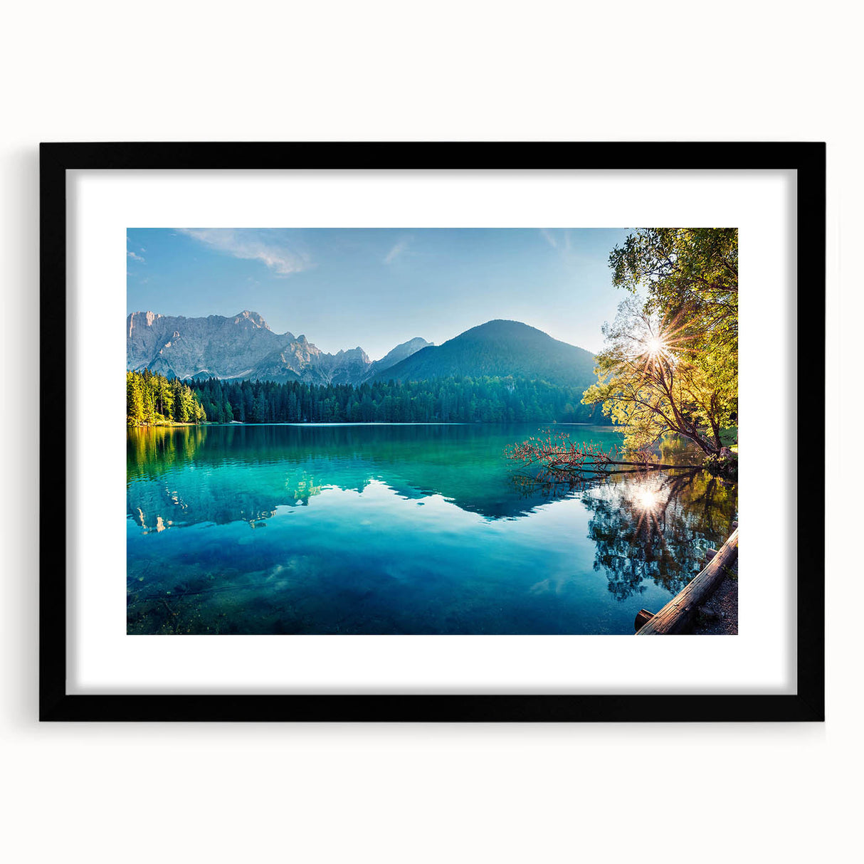 Framed wall art featuring a serene lake landscape design, showcasing vibrant blue and green hues, elegantly matted and displayed in a sleek black frame. Perfect for enhancing home decor.