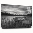Acrylic glass wall art featuring a serene landscape of a tranquil lake surrounded by lush greenery, displayed in a modern side-view frame with decorative pins for added style.