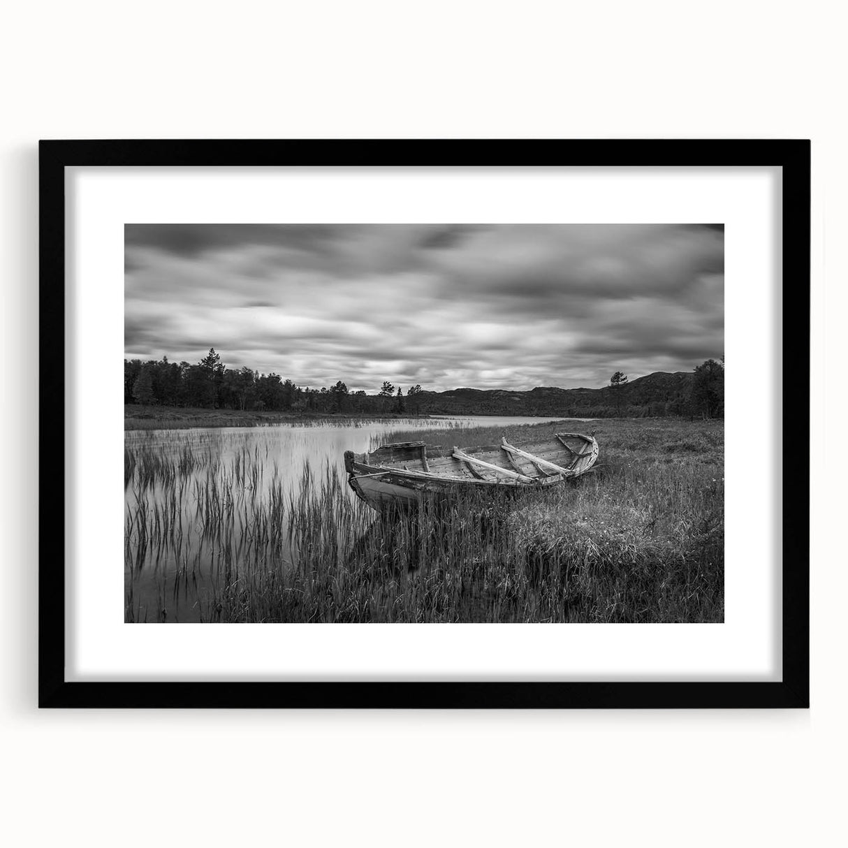 Framed wall art showcasing a serene lake landscape with vibrant colors, featuring a black mat and frame, ideal for enhancing home decor.