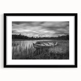 Framed wall art showcasing a serene lake landscape with vibrant colors, featuring a black mat and frame, ideal for enhancing home decor.