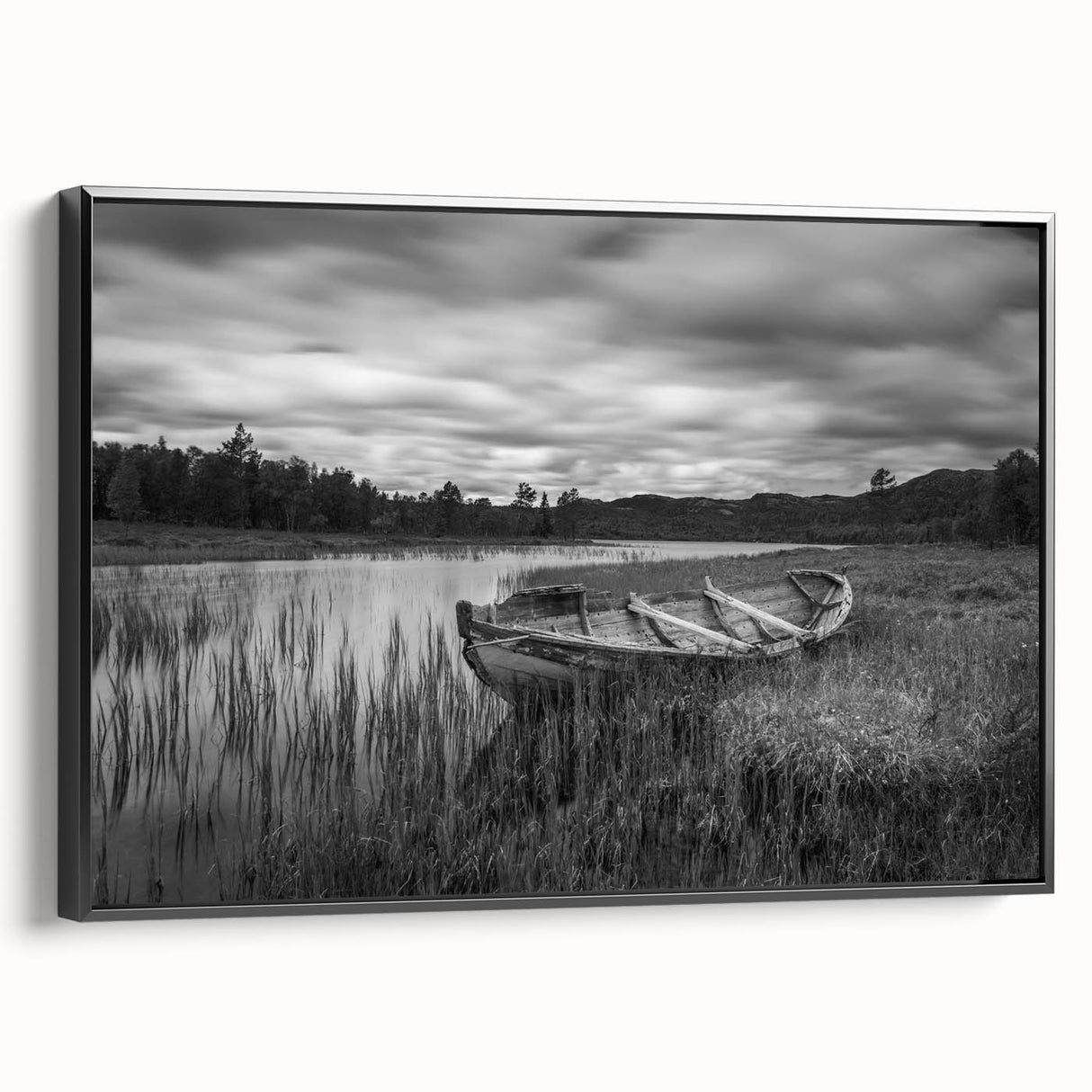 Framed canvas wall art showcasing a serene lake landscape design with rich blues and greens, displayed at a slight angle to highlight its black frame and textured surface. Perfect for modern home decor.