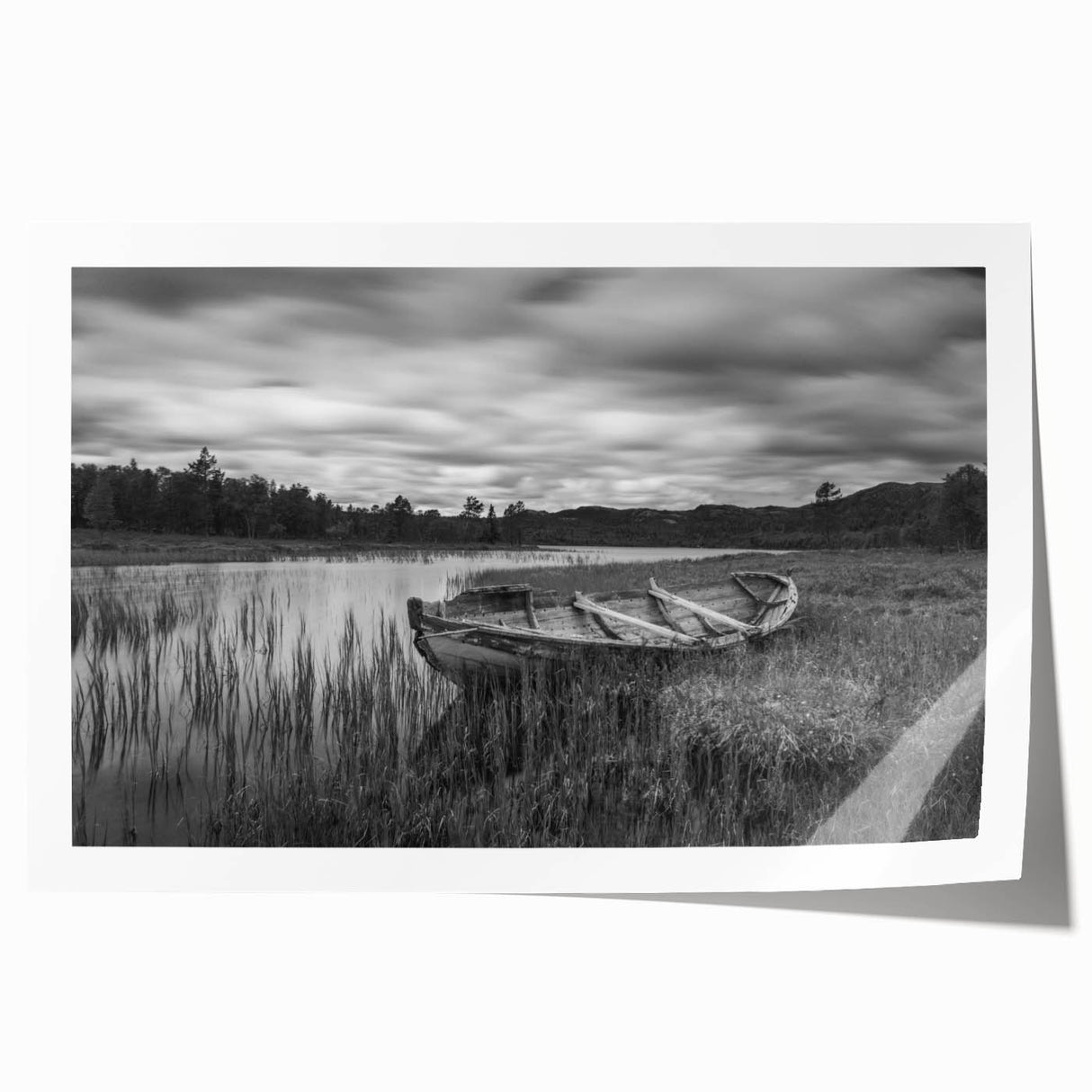 Vibrant rolled print of a tranquil lakeside landscape featuring lush greenery and a serene blue sky, ideal for home decor or office spaces, carefully packaged for protection.