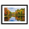 Framed wall art collection featuring serene lakeside landscapes in soft colors, with a sleek black frame and white mat, perfect for modern home decor.