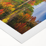 Serene rolled canvas depicting a tranquil lake landscape at sunset, showcasing vibrant colors and reflections, ideal for home decor. Perfect for nature enthusiasts.