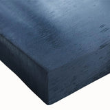 Close-up of a stretched canvas wall art piece depicting a serene lake landscape with vibrant colors and intricate details, perfect for home decor.