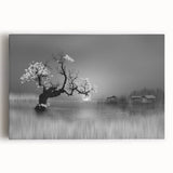 Stretched canvas wall art showcasing a serene lake landscape with vibrant blue waters and lush green trees, perfect for home decor and nature enthusiasts.