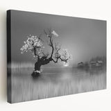 Stretched canvas wall art featuring a serene lakeside landscape with vibrant blues and greens, showcasing tranquil reflections and natural beauty, perfect for home decor.