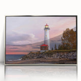 Framed wall art featuring a coastal landscape with a lighthouse, designed in a modern style. The artwork is set in a sleek silver frame, enhancing its nautical theme and bright colors, perfect for home decor or coastal-themed spaces.