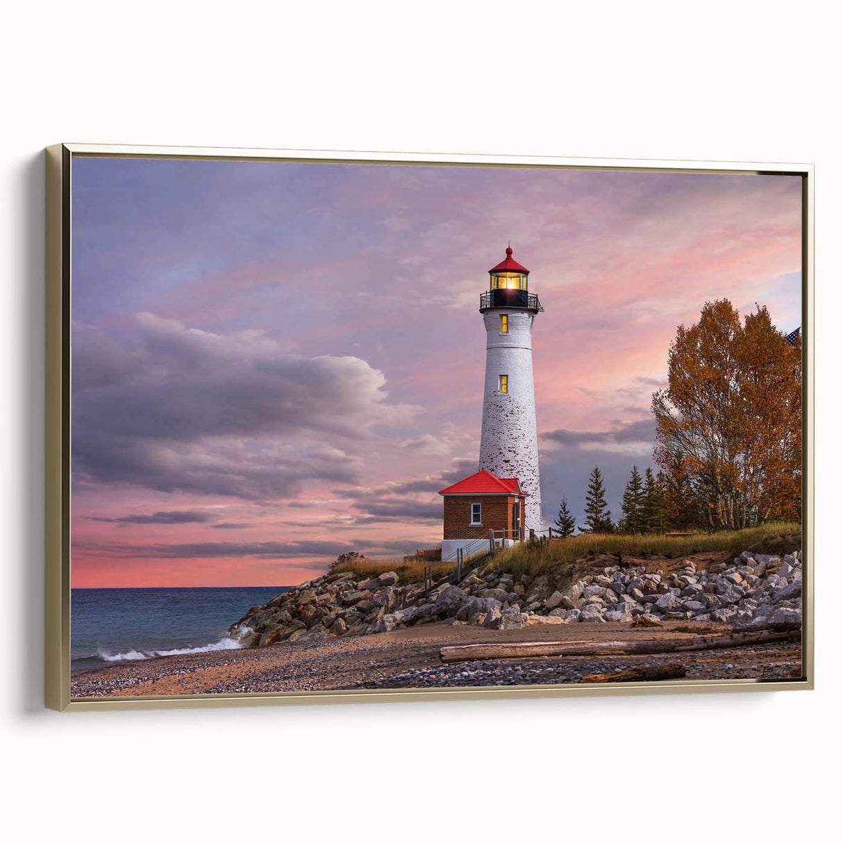 Framed canvas wall art showcasing a serene lighthouse design against a coastal landscape, featuring elegant gold accents and a side view perspective. Ideal for nautical-themed decor.