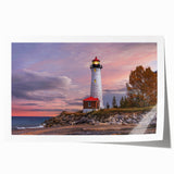 Coastal landscape wall art print showcasing a vibrant lighthouse against a serene sky, perfect for home decor or nautical-themed interiors.