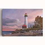 Stretched canvas wall art featuring a serene lighthouse design against a vibrant sunset, perfect for coastal-themed decor. Ideal for enhancing home or office ambiance.