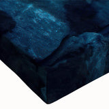 Close-up of a stretched canvas wall art piece showcasing a serene lighthouse design against a vibrant sunset, perfect for coastal-themed decor. The artwork features rich colors and intricate details, enhancing any living space.