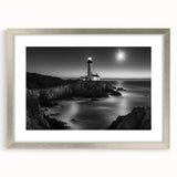 Framed landscape wall art featuring a silver mat and a lighthouse design, perfect for coastal decor. Ideal for enhancing living spaces with serene imagery.