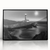 Framed acrylic wall art featuring a serene lighthouse design, showcased in a sleek black frame, perfect for enhancing coastal-themed interiors.