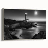Framed canvas wall art featuring a silver-bordered lighthouse design, showcasing a serene coastal landscape with vibrant colors and intricate details, perfect for home decor.