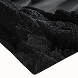 Close-up of a stretched canvas wall art featuring a serene lighthouse design, showcasing vibrant colors and intricate details, perfect for coastal-themed decor.