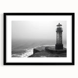 Black-framed landscape wall art featuring a serene lighthouse design with a calming ocean backdrop, perfect for enhancing coastal home decor and interior aesthetics.