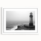 Lighthouse-themed wall art collection framed in white matting, showcasing a serene coastal landscape, ideal for enhancing home decor with nautical charm.