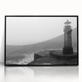 Framed acrylic wall art showcasing a lighthouse design against a vibrant landscape, featuring a sleek black frame and ideal for coastal decor enthusiasts.
