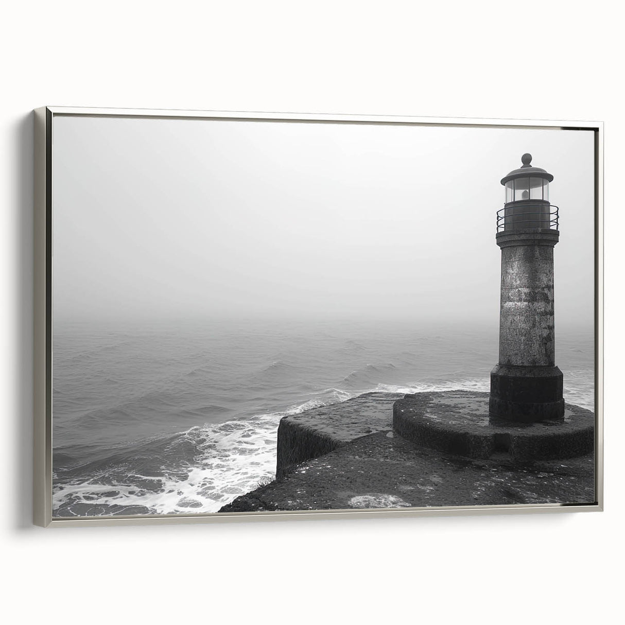 Framed canvas wall art showcasing a serene lighthouse design with a coastal landscape, featuring a silver frame and vibrant colors, ideal for nautical-themed decor.