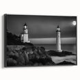 Framed canvas wall art showcasing a serene lighthouse landscape design with vibrant colors, featuring a black frame and side view perspective, perfect for coastal decor.