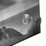 Close-up view of a vibrant acrylic glass wall art piece depicting a serene lighthouse landscape, showcasing rich colors and intricate details, perfect for home decor.