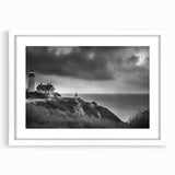 Framed wall art featuring a serene lighthouse landscape design with a white mat, ideal for coastal-themed home decor, showcasing vibrant colors and intricate details.